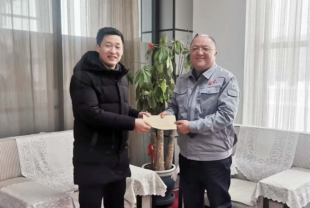 集团党委书记梁军接待辽阳市残联辅导到win必赢走访慰问 (1).jpg